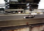 I think I'm right in saying this is Eric Helary in the 13 Courage.  By 6 am (roughly when this shot was taken), the Courage was in a solid 3rd, chasing down the  51 and 59 McLarens