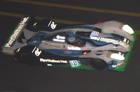 Its not always easy to get these shots - even though the cars seem so close when you're above them in the grandstand.  Erik Comas brings in the #18 Pescarolo.  