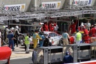 In front of the Ferrari is the ill-fated Imsa Performance Porsche of Narac, Long and Lietz, which went out on 26 laps after a shunt with the #80 Flying Lizards Porsche