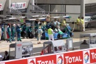 Up at the far end of the pit road, in their customary spot, the Pescarolo team work on the #16 car