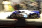 It's surprising what you can do with Photoshop and an out of focus Lola Aston Martin....!
