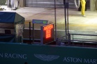 The pit board shows that Andrea Piccini was driving the #007 Aston Martin and he was due for a pit stop....