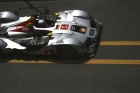 First pit stop for Allan McNish in the #1 Audi.  This is a rare photo of this car - can you see why?  It has the first place marker light - sadly for the #1 Audi crew, that single light only lit up for one lap during the 2009 Le Mans 24 Hours.....