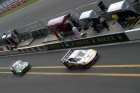 The Drayson Racing Aston Martin #87 follows in the #89 Hancook FarnbacherFerrari